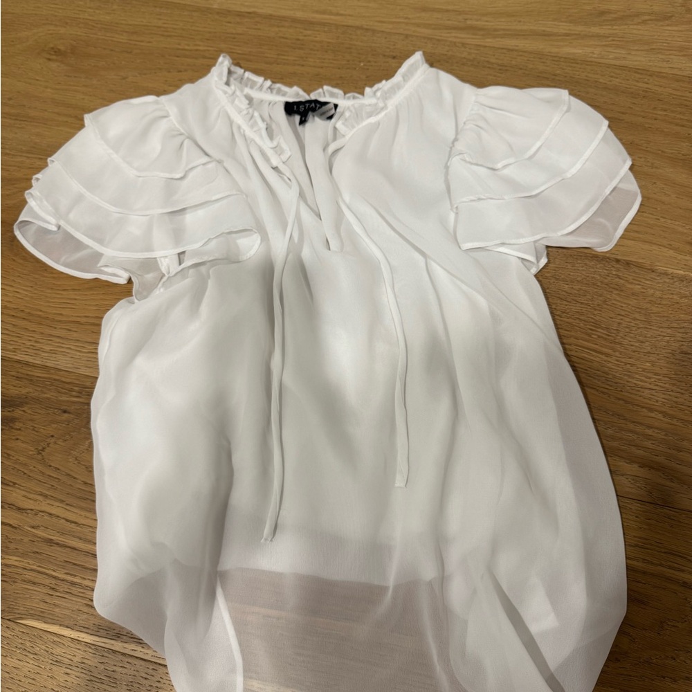 1. State Ruffled White Blouse
